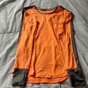 Orange long sleeve running t-shirt.